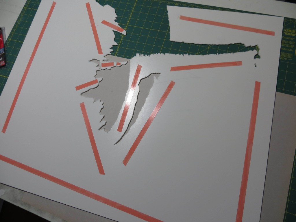 This is the biggest shape, covered with double-sided tape and ready to be placed on the backing plate.